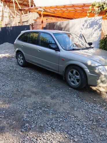 Mazda: Mazda Familia: 2000 г., 1.8 л, Механика, Бензин, Хетчбек
