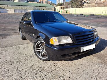 Mercedes-Benz: Mercedes-Benz 240: 2.4 l | 1998 il Sedan