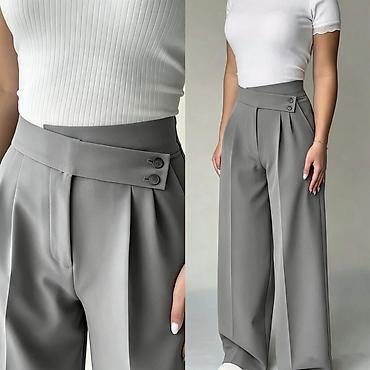 helanke elastina: Ženske široke pantalone sa visokim strukom
2400din — 4