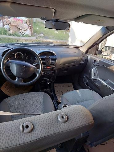 byd qin plus: Saipa Saina (sedan), ağ rəng. Masin Mastaga erazisinde yerlesir, tam — 8