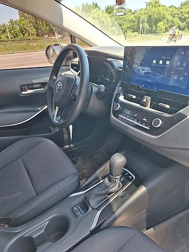 Продажа авто: Toyota Corolla: 2023 г., 1.8 л, Вариатор, Гибрид, Седан — 3