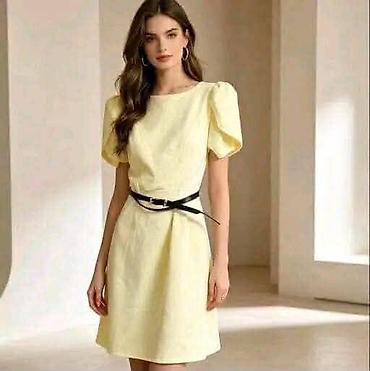 tiffany haljine: Elegantna ženska haljina A-kroja sa kratkim puf rukavima. Okrugli — 2