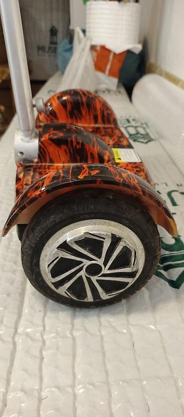 5: Elektrikli hoverboard (özünü-tarazlayan skuter) – alov naxışlı gövdə — 7