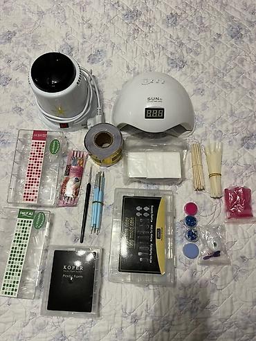 Другое оборудование для салонов красоты: Набор для маникюра В комплекте: - УФ/LED лампа SUN 5. - — 1