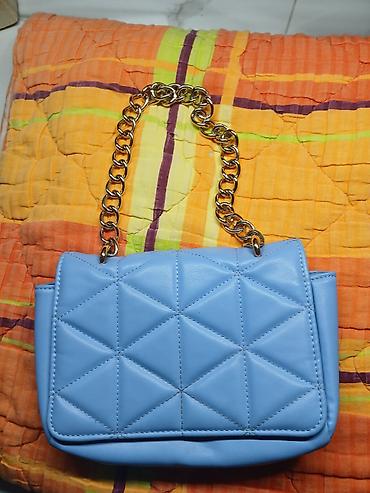 Torbe: Plava torbica-1500din Kožna torbica(čista koža)-2000din — 1