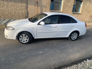 бокс на крышу авто купить в бишкеке: Белый седан компакт-класса. Основные характеристики и оснащение: -