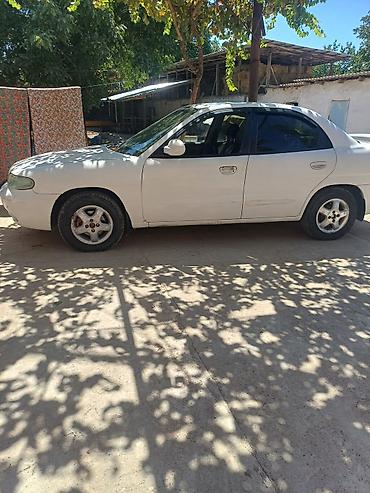 седло на даф: Daewoo Nubira: 1997 г., Механика, Седан — 6