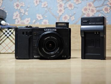 Фотоаппараты: Samsung EX1 — это компактная цифровая камера премиум-класса. Она