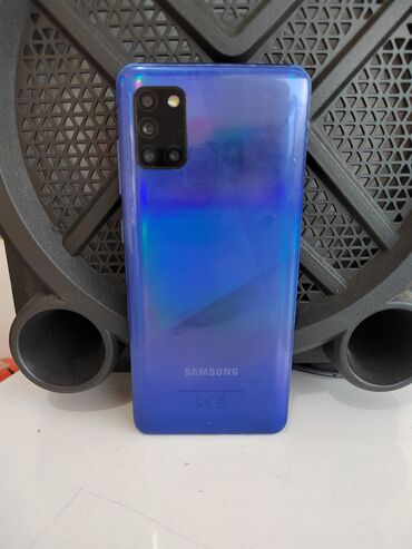 Мобильные телефоны и аксессуары: Samsung Galaxy A31, 128 ГБ, цвет - Синий, Кнопочный, Отпечаток пальца, Face ID