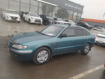 lincoln town car: Mazda 626: 2000 г., 1.8 л, Механика, Бензин