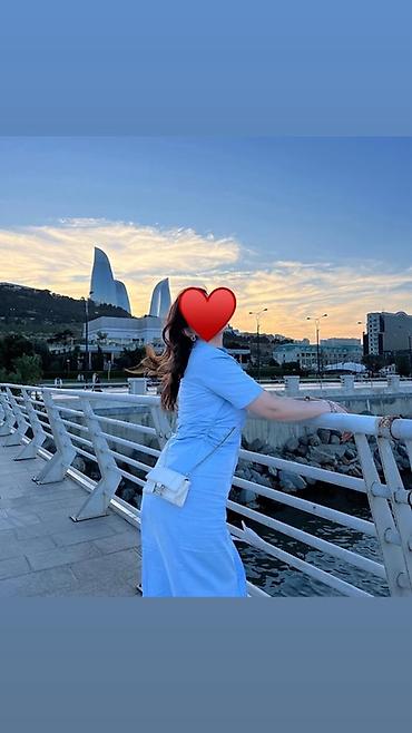 Donlar: Mavi rəngli qolsuz-olmayan, düyməli midi don - Rəng: açıq mavi - — 2