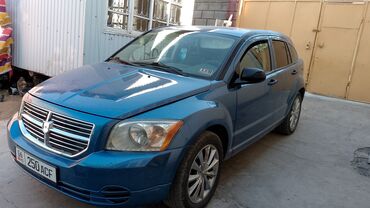 выкупка авто: Автомобиль Dodge Caliber синего цвета. Это компактный и практичный