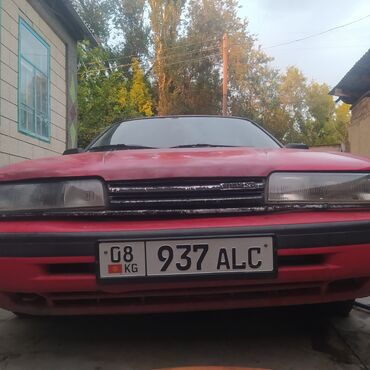 двигатель мазда 6 2.0 дизель купить: Красный седан Mazda 626, предназначенный для комфортной и надежной