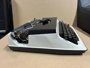 Stari uređaji: Hermes 550 – prenosna mehanička pisaća mašina - Model: Hermes 550 — 16