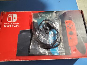геймпад для игр: Nintendo Switch (не OLED), неоновая версия с джойконами Neon Blue