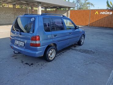 шины на хова: Mazda Demio: 1999 г., 1.5 л, Механика, Бензин, Универсал