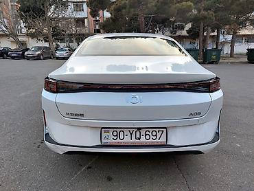 Chery: Model: Omoda A05 (sedan) Rəng: ağ Yanacaq sistemi: hibrid (benzin + — 3