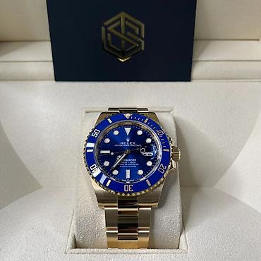 meta eynək: Rolex Submariner Date – 18 kt sarı qızıl, mavi siferblat və bezel — 9