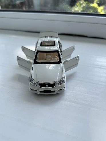 оюнчук машине: Машинка Toyota Crown Игрушечная машина тойота краун Открываются все — 1