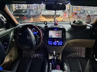 Hyundai: Hyundai Elantra sedan - Kuzov: 4 qapılı sedan, tünd bənövşəyi rəng - — 10