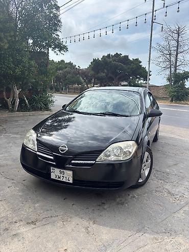 Транспорт: Nissan Primera: 2 л | 2005 г. Седан — 10