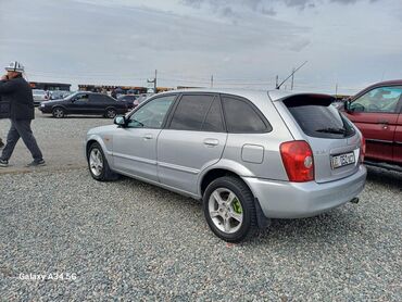 Mazda: Mazda 323: 2003 г., 1.6 л, Механика, Бензин, Хэтчбэк