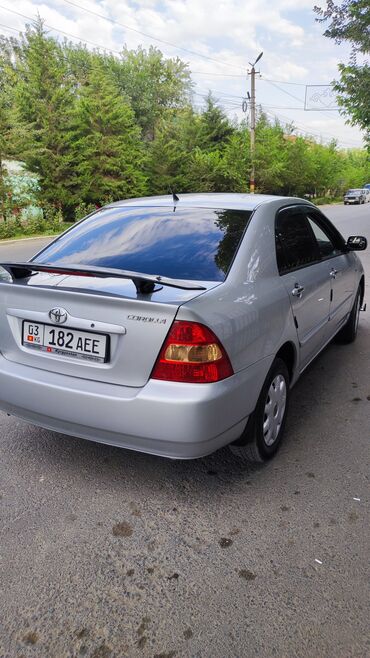 зарядка на авто: Toyota Corolla: 2003 г., 1.6 л, Механика, Бензин, Седан