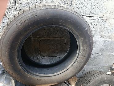r16 4100: Шины Bridgestone (бескамерная), зимний тип (надпись Studless на — 2