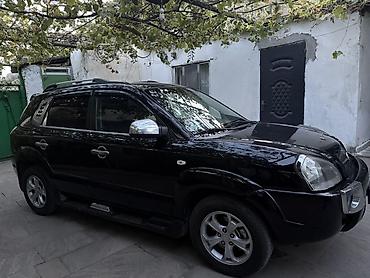 e39 rul: Hyundai Tucson: 2 л | 2009 г. Кроссовер — 4