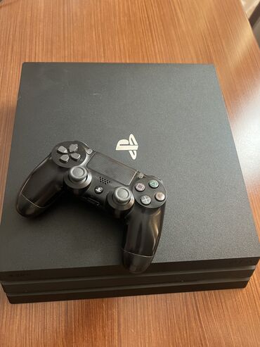 PS4 (Sony Playstation 4): Playstation 4 pro 1TB. ideal veziyyetdedir prablemsiz usdunde sunuru