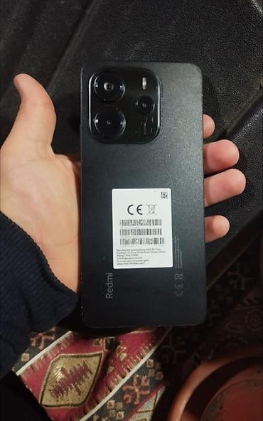 14 pro max kabro: Redmi smartfon Xüsusiyyətlər: - Arxa tərəfdə üçlü kamera modulu və — 4