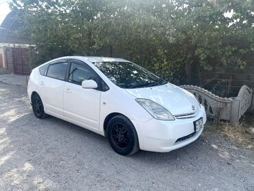 тойота приус альфа цена: Toyota Prius (XW20), белый хэтчбек-гибрид. Ключевые особенности: -