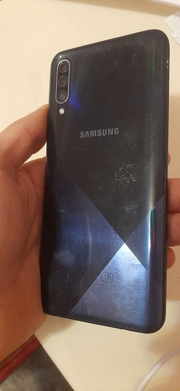 samsung a30s ekran: Samsung A30s, Barmaq izi