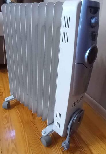 yag qizdirici: Elektrik radiatoru, 11 seksiyalı