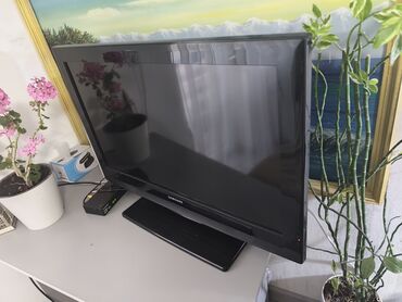 камира наблюдения: Телевизор Samsung (плоская панель) с настольной подставкой и
