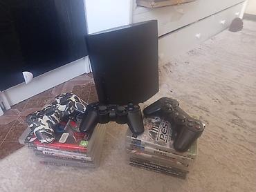 PS3 (Sony PlayStation 3): Игровая консоль Sony PlayStation 3 (модель Slim) с набором дисков — 9