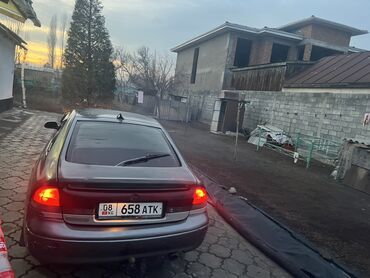 Mazda: Mazda 626: 1994 г., Хэтчбэк — 7