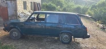 Транспорт: VAZ 2104 universal - Kuzov: 5 qapılı universal, tünd yaşıl rəng - — 2