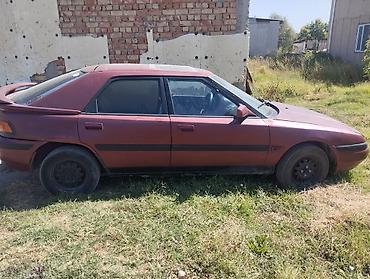 m57 купить: Mazda 323: 1993 г., 1.6 л, Механика, Бензин, Лифтбек — 1