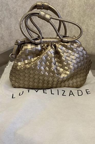 meta eynək: Lutvelizade toxunma detallı qadın çantası - Model: yumşaq “pouch” — 1