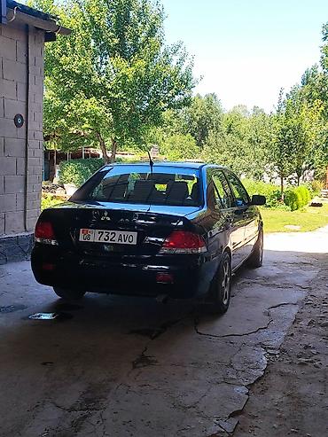 полировщик авто: Mitsubishi Lancer: 2003 г., 1.6 л, Механика, Бензин, Седан — 2
