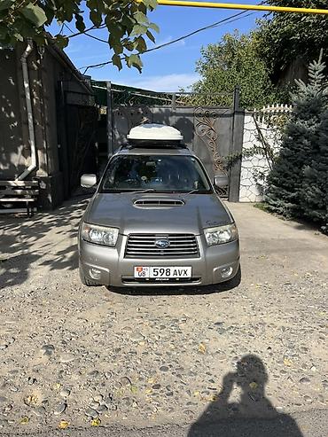 е34 4 4: Subaru Forester: 2005 г., Универсал — 3