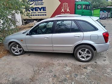 2 8: Mazda 323: 2003 г., 1.6 л, Механика, Бензин, Седан — 4