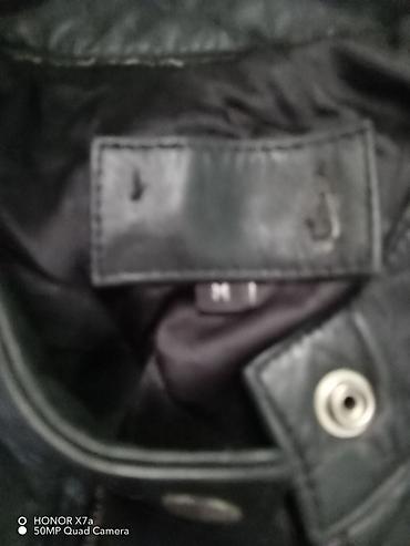 kožne patike: Crna kožna jakna, minimalističkog „biker“/motociklističkog stila. - — 2