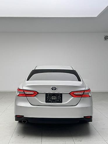 byd e2 2025: Toyota Camry: 2017 г., Гибрид, Седан — 7