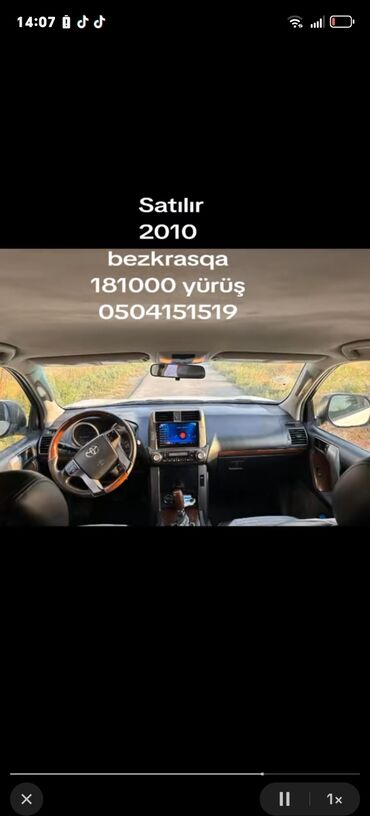 Bu, 2010-cu il istehsalı, ağ rəngli Toyota Land Cruiser Prado