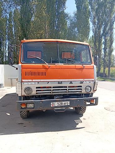 кпп портер 1: Самосвал КамАЗ оранжевого цвета, колесная формула 6×4. Металлический — 2