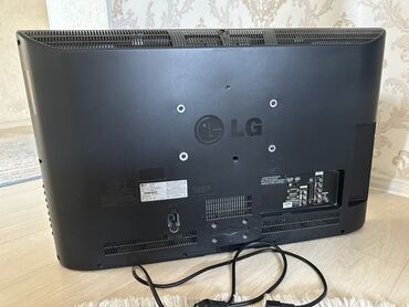доп свет: Черный ЖК-телевизор LG с плоским экраном, подходящий для домашнего