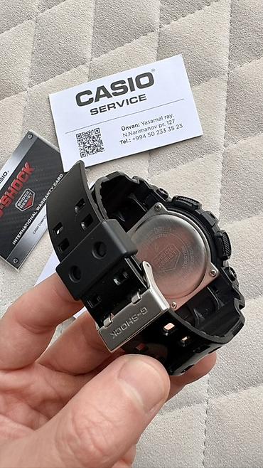 g shock: Casio G-Shock qol saatı. Qara rəngli, iri korpuslu və idman üslublu — 8