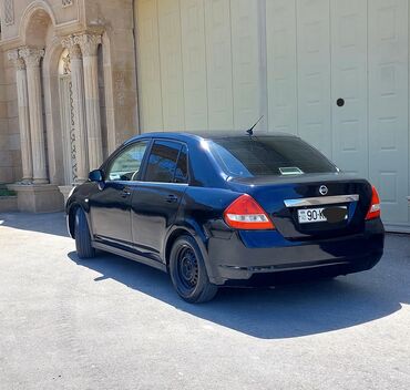 Nissan: Tecili satilir ekanom ve dozumlu masindi tekerleri yaxsidi salon